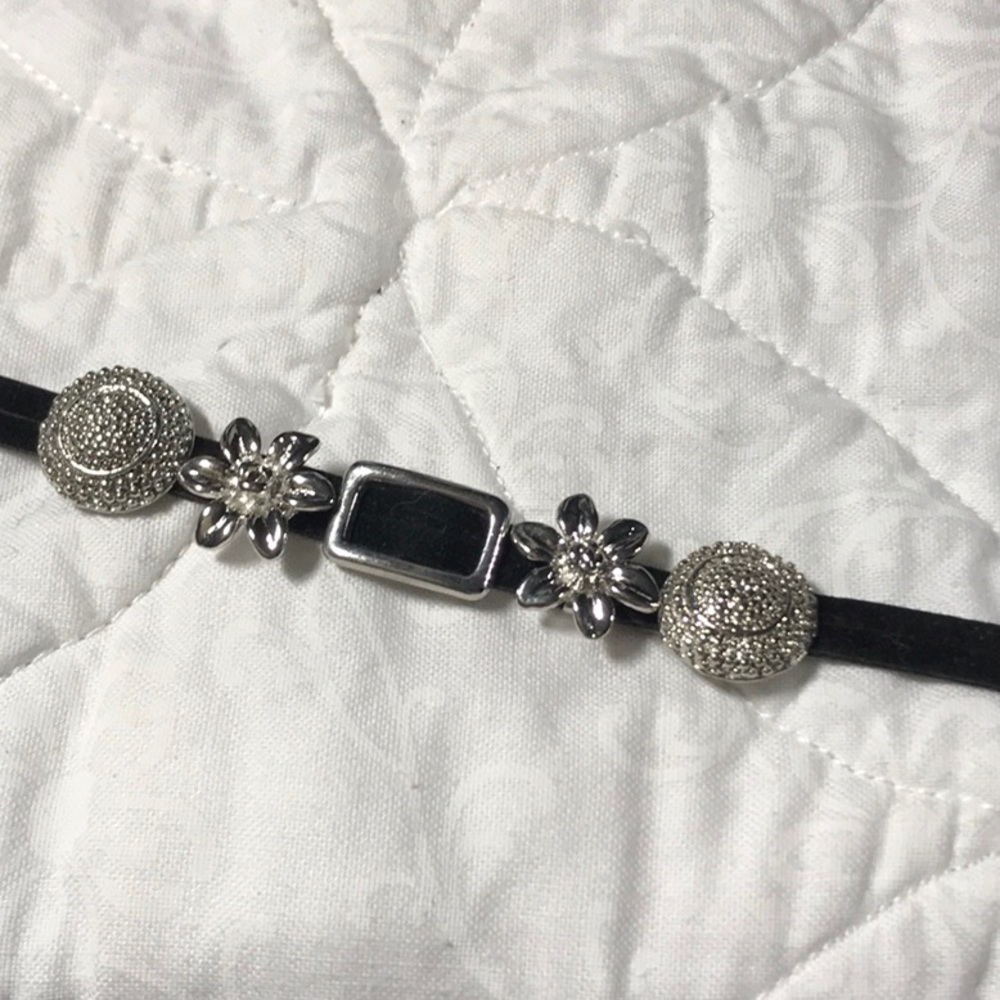 black felt bracelet, silver tone charms